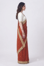 Women's Rust Orange Woven Silk Blend Saree with Golden Tassel Border - Image 4