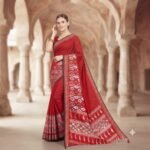 Women's Red Silk Bandhani Print Saree with White Ethnic Motifs, Mirror Work Pallu & Tassel Detailing – Festive, Traditional Saree